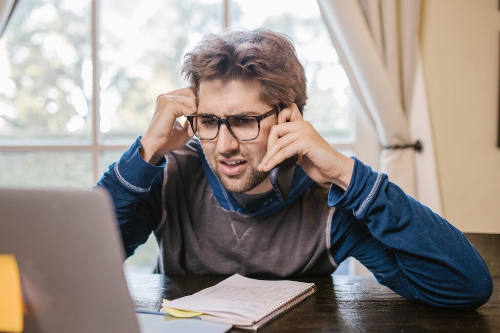 writer frowning at computer, agency, writing